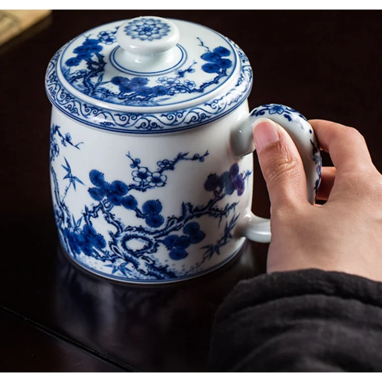 Blue and White Three Friends of Winter Lidded Mug: front