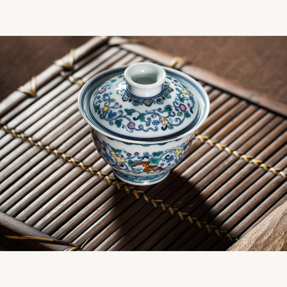 Doucai Five Blessings Scrollwork Gaiwan: table view
