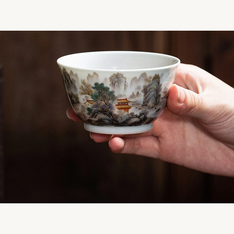 Falangcai Autumn Mountain Retreat Porcelain Teacup: held side