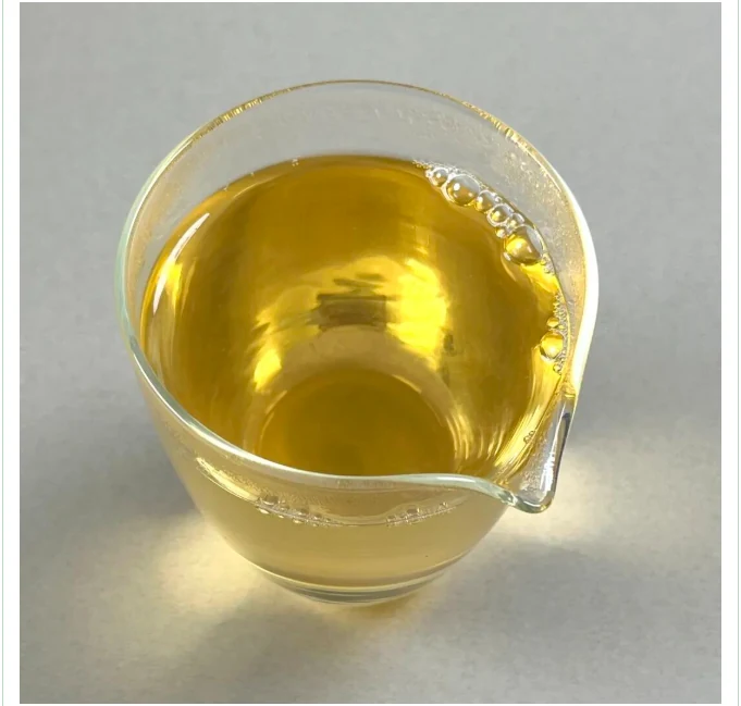 Golden white tea liquor in a clear glass pitcher