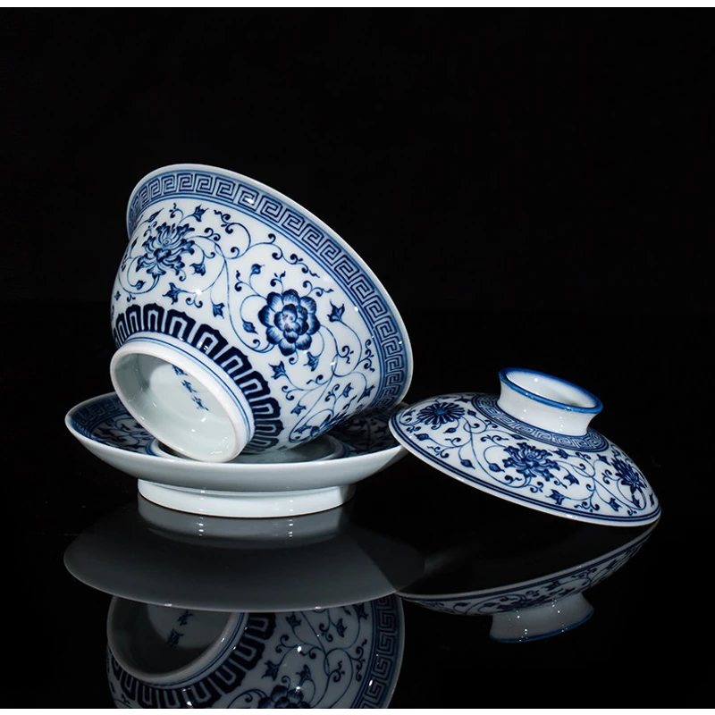 Side view of the bowl, separate lid and matching saucer