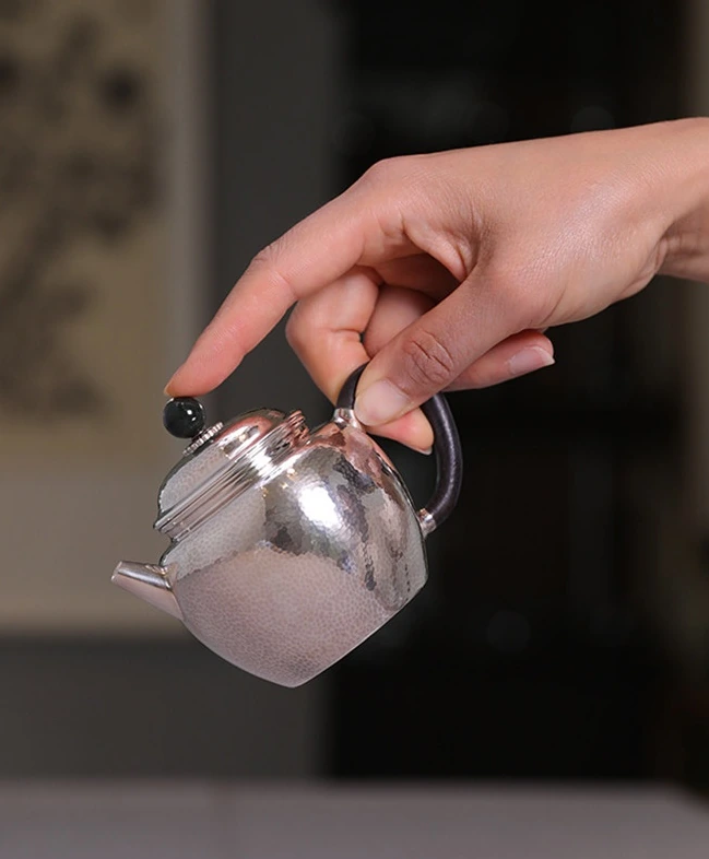Autumn Moon Handmade 9999 Silver Teapot — 180mL — Pouring position