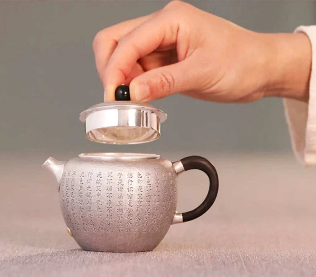 Heart Sutra Handmade 9999 Silver Teapot — 200mL — Lid and opening detail