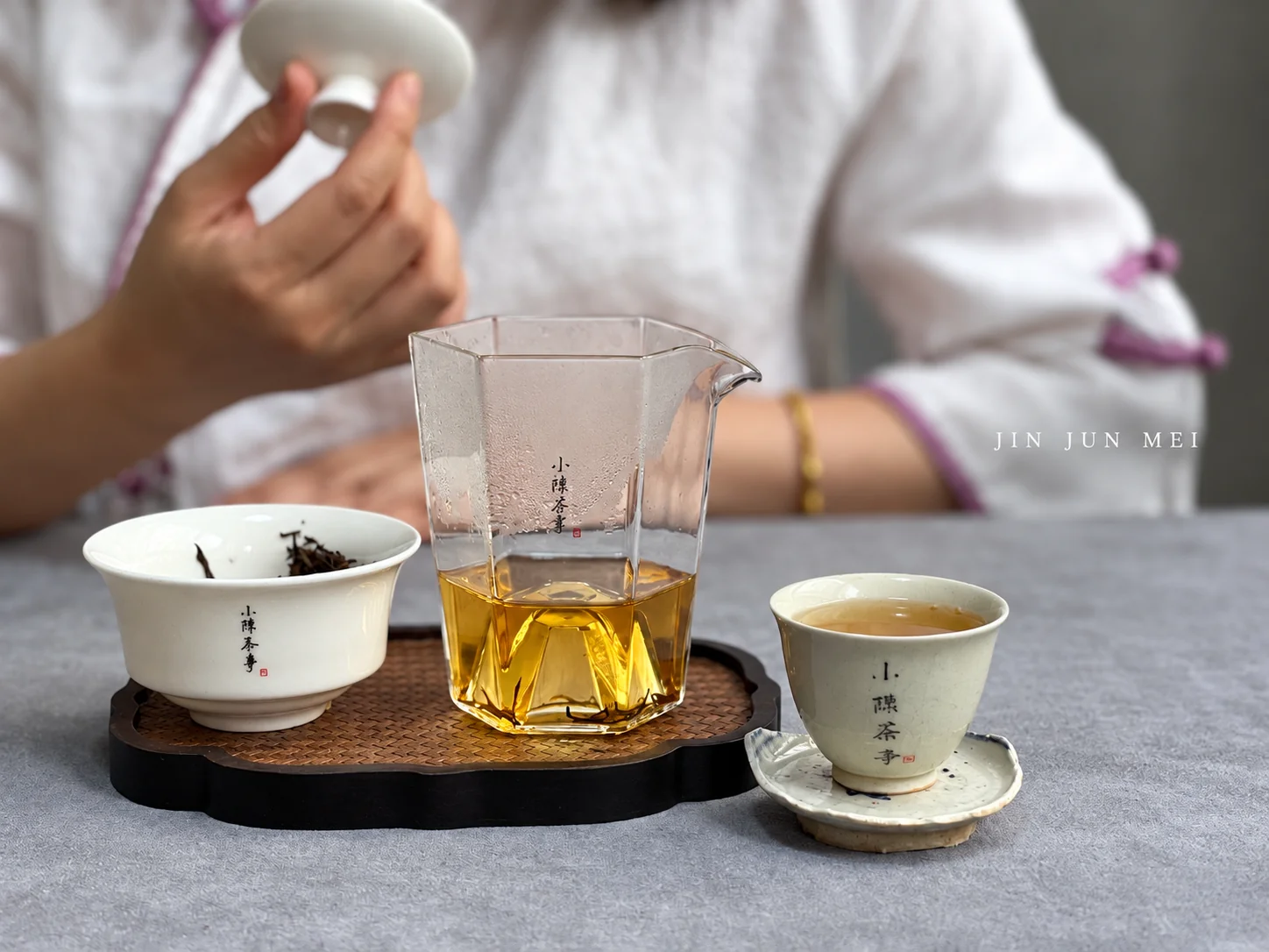 Gaiwan, pitcher and cup after draining an infusion