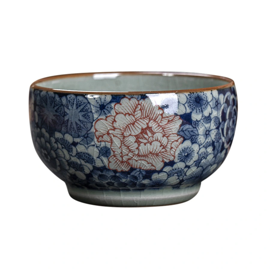Studio view of the hand-painted blue and white millefleurs teacup