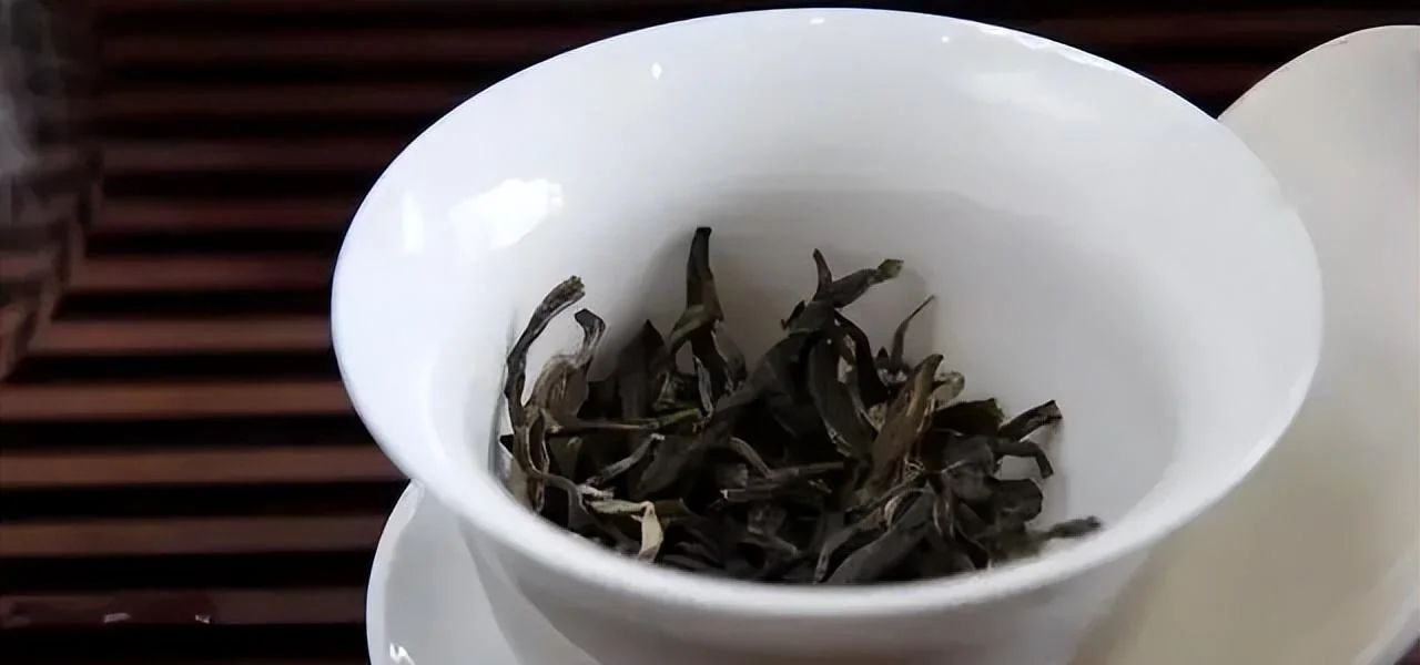 Tea leaves in porcelain gaiwan