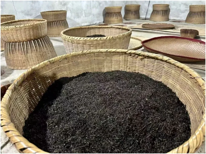 Large round bamboo tea baskets in storage
