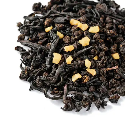 Black tea leaves with small pale almond pieces