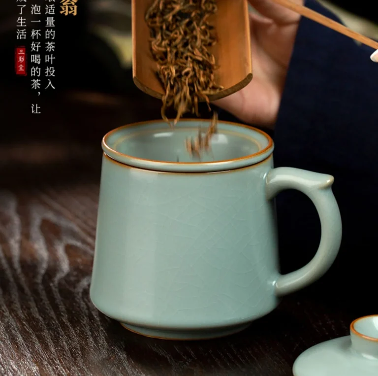 Loose tea being added to the ceramic infuser