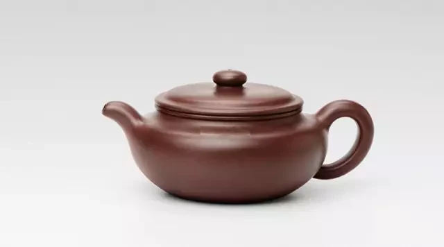Bianfu teekanne mit einem breiten, abgerundeten Bauch, einem breiten Deckel und einer gewellten Schlaufe