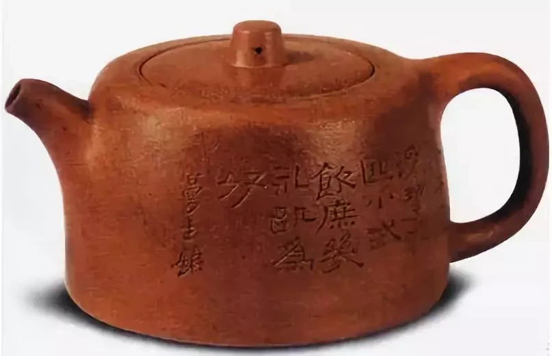 Zylinderformiger Jinglan teekanne mit eingravierter Kalligraphie, breitem Deckel und bügelhenkel