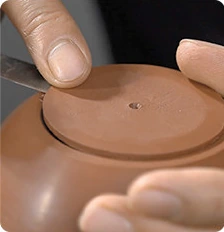 Fitting a clay base