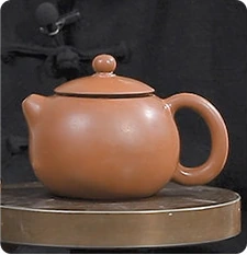 Completed unfired clay teapot